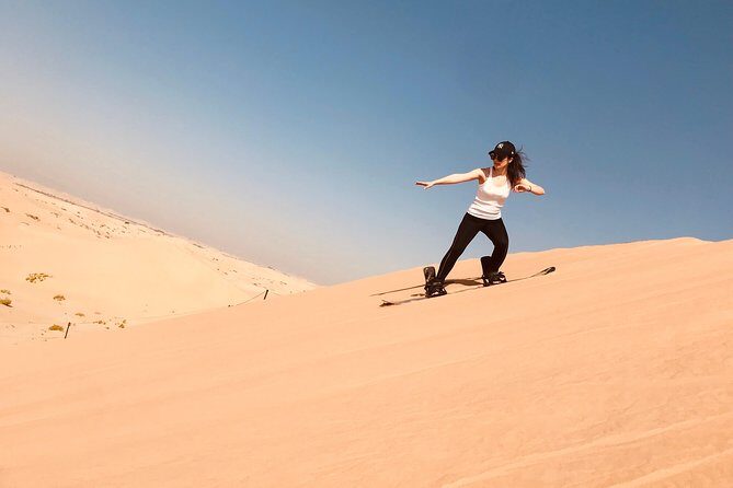 Abu Dhabi Desert safari with BBQ Dinner,Sandboarding & Camel ride - The Traditional Bedouin Camp Experience