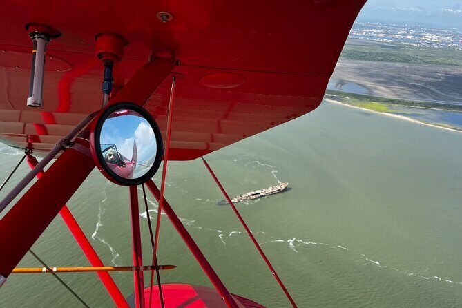 Bolivar Lighthouse Tour, Open Cockpit Biplane Ride - The Retro Feel and What It Adds