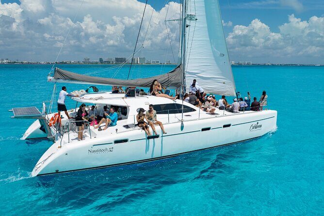 Cancun Catamaran: Isla Mujeres, Snorkeling, Drinks & Buffet Lunch - Authentic Experiences and Practical Details