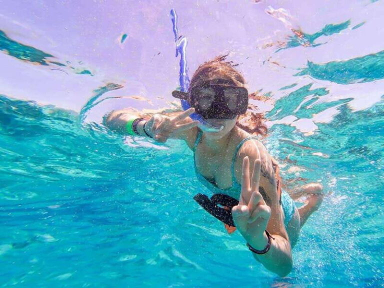 Cancun: Isla Mujeres Premium Catamaran Half-Day Tour - Breakdowns of the Itinerary