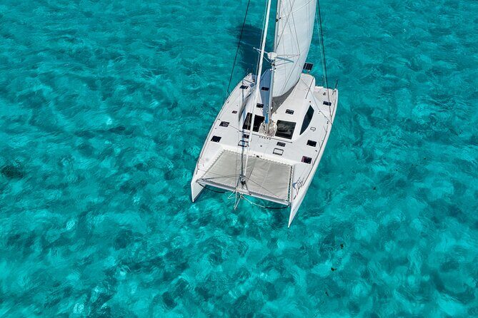 Cancun Private Catamaran Cruise Open Bar & Snorkeling Experience - Key Points