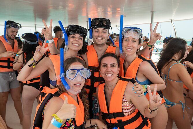 Catamaran Adventure Isla Mujeres with Snorkeling and Beach Club - Authentic Experiences and Practical Aspects