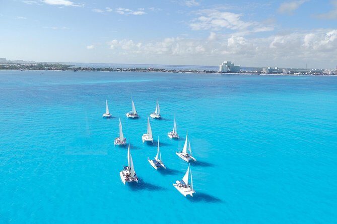 Catamaran Isla Mujeres Tour with Hotel Pick Up included - Authentic Traveler Perspectives