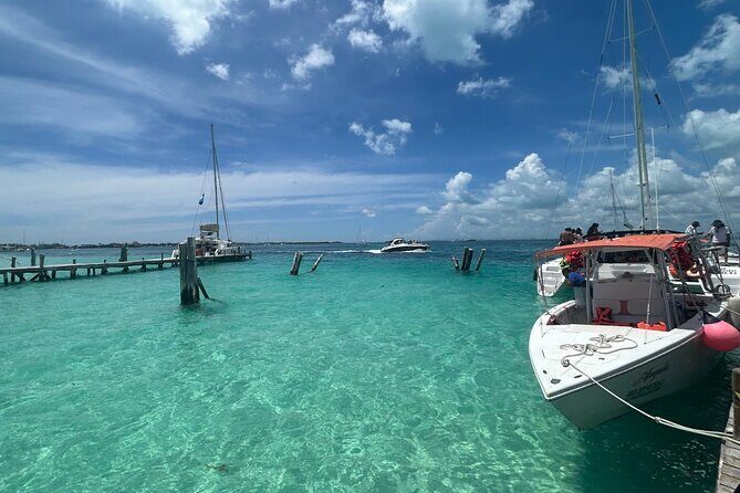 Catamaran Sail with Snorkeling and Beach Club of Isla Mujeres - Snorkeling at El Meco Reef