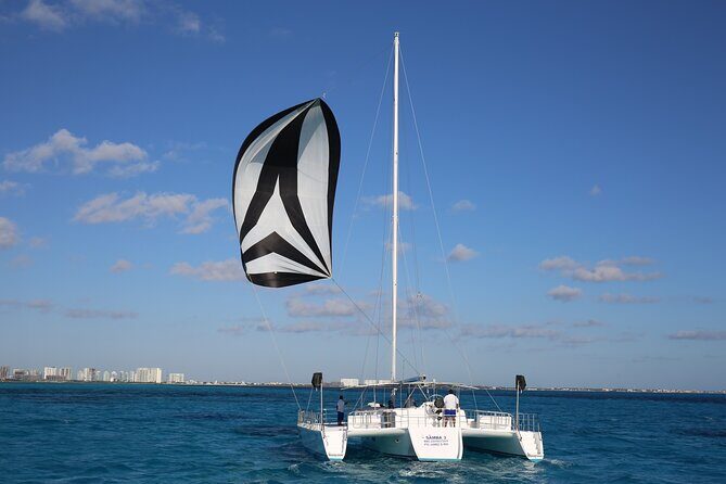 Catamaran to Isla Mujeres Snorkeling, Beach Club and Lunch Tour - The Catamaran Journey: Setting Sail for Isla Mujeres