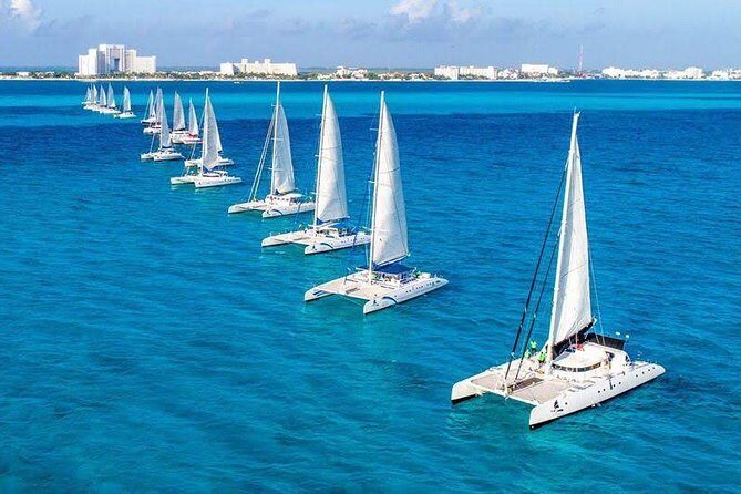 Catamaran tour to Isla Mujeres with snorkeling, open bar - Authentic Traveler Insights