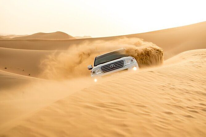 Combo 1- MORNING SAFARI+HALF DAY CITY TOUR - The Desert Adventure: Dune Bashing, Camel Ride, and Sandboarding