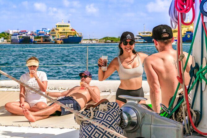 Deluxe Catamaran tour to Isla Mujeres with Open Bar and Lunch - Overview of the Tour Experience
