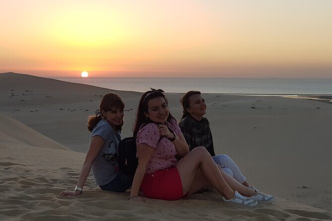 Doha: Sunrise /Sunset Desert Safari with Sand Boarding,Camel ride - The Highlight: Dune Bashing and Sandboarding