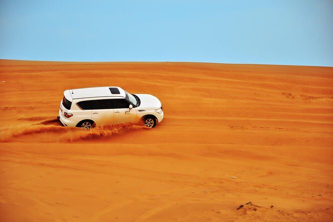 Dubai Desert 4x4 Dune Bashing, Sand-boarding, Camel Riding, Dinner ATV Vip Table - What’s Included and What’s Not