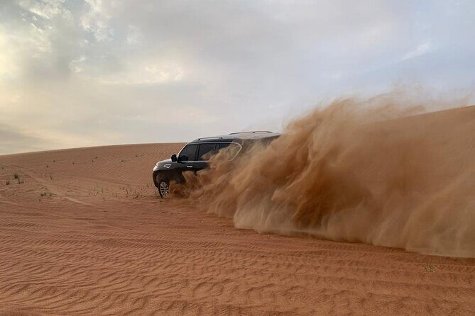 Dubai Desert Safari-BBQ Dinner, Belly Dance, Fire show - Dining Under the Stars: BBQ and Live Entertainment