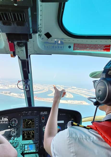 Dubai: Helicopter Ride, Old Town Walking Tour, Abra & Snacks - Key Points