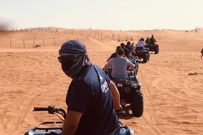 Dubai Red Dunes Quad Bike Tour,Sandboard, Camel ride & BBQ Dinner - Authentic Experiences and Top Guides