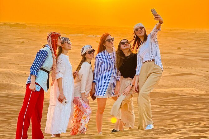 Dubai Sunset Red Dune Desert Safari, Sandboarding and Camel Ride - What the Reviews Tell Us