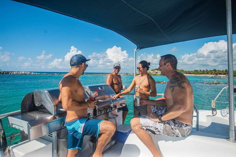 From Puerto Aventuras: Share Catamaran Tour
