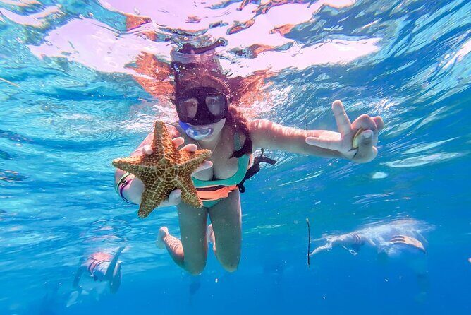 Fun Catamaran Excursion to Isla Mujeres with Unlimited drinks! - Authentic Experiences Highlighted by Travelers