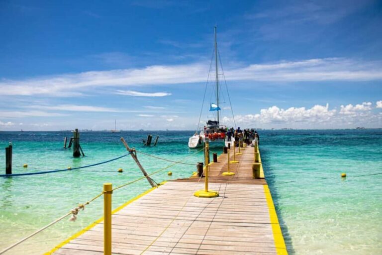 Isla Mujeres: Catamaran Ride with Open Bar, Snorkeling, and Lunch - Authentic Experiences and Review Highlights