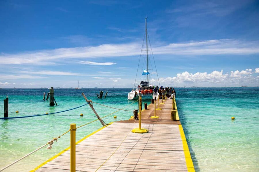 Isla Mujeres: Catamaran Ride with Open Bar, Snorkeling, and Lunch - Authentic Experiences and Review Highlights