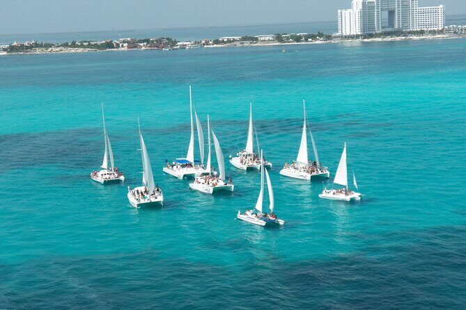 Isla Mujeres Catamaran Snorkeling, Beach Club Lunch and Open bar - The Isla Mujeres Stop: Historic Charm and Shopping
