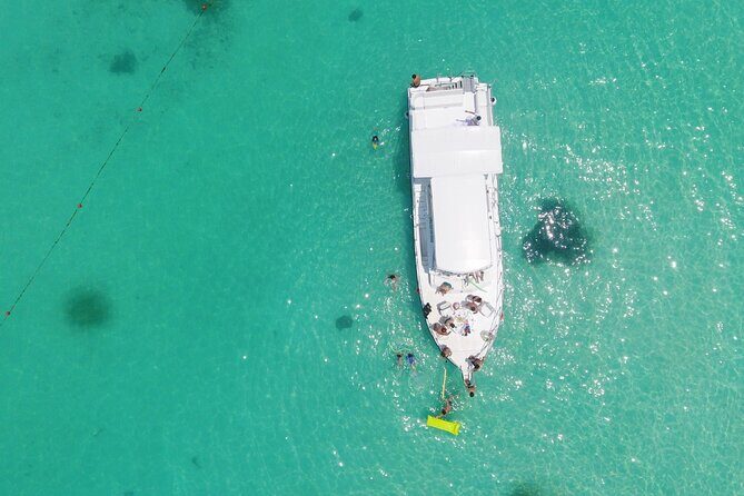 Isla Mujeres Full Day Tour on Yacht with Snorkel and Buffet - First Stop: Snorkeling at the Reefs