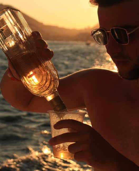 Los Cabos Catamaran: Iconic Sunset Cruise with Drinks & DJ - The Itinerary in Detail