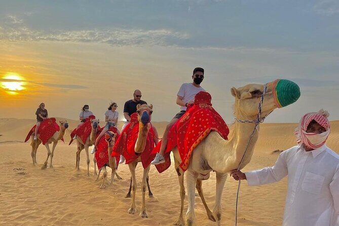 Morning Desert Safari with Sandboarding & Camel Ride on Red Dunes - The Experience: What It Means for Travelers