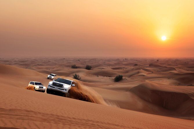 Overnight Desert Experience with safari and BBQ Dinner - Dune Bashing & Sandboarding: The Heart of the Adventure