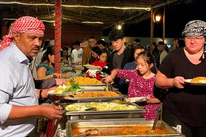 Red Dune Desert Safari Dubai Camel Ride Sandboarding & BBQ Dinner - Authentic Experiences and Genuine Hospitality