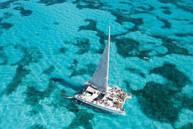 Sail Away Catamaran Day Trip with Snorkeling to Isla Mujeres - What the Tour Means for You
