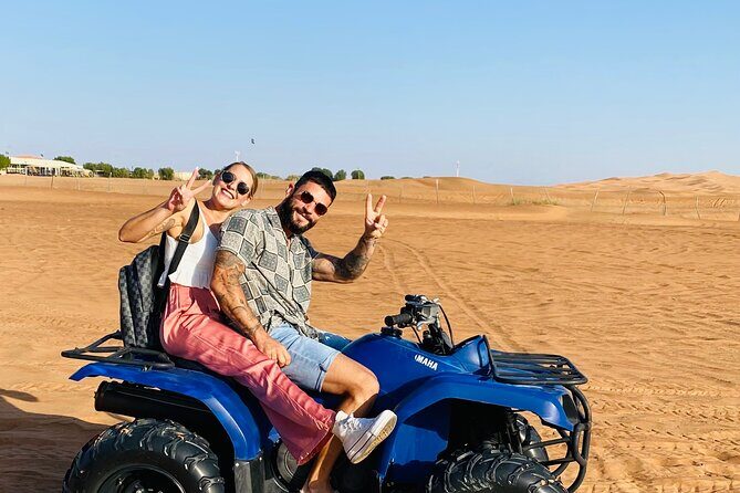 Self Drive Quad Bike in Open Desert With Sand Boarding and Camels - Sandboarding: A Classic Desert Activity