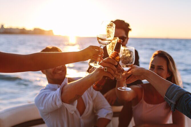Shared Cabo Sunset Cruise with Open Bar and Scenic Views - The Itinerary in Detail