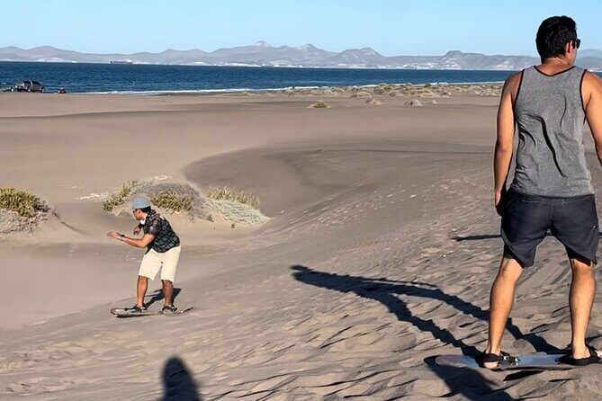 Slide into the sunset by Sandboarding in Las Dunas Del Mogote - What Past Travelers Say