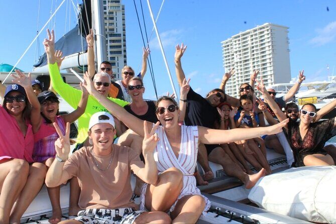 Top Isla Mujeres Catamaran Tour with Snorkel Open Bar and Buffet lunch - The Island Stop and Beach Club