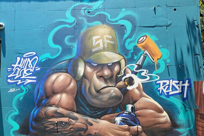 Tour Evolution of Muralism paints your Grafiti - Visiting Historic Murals and Markets