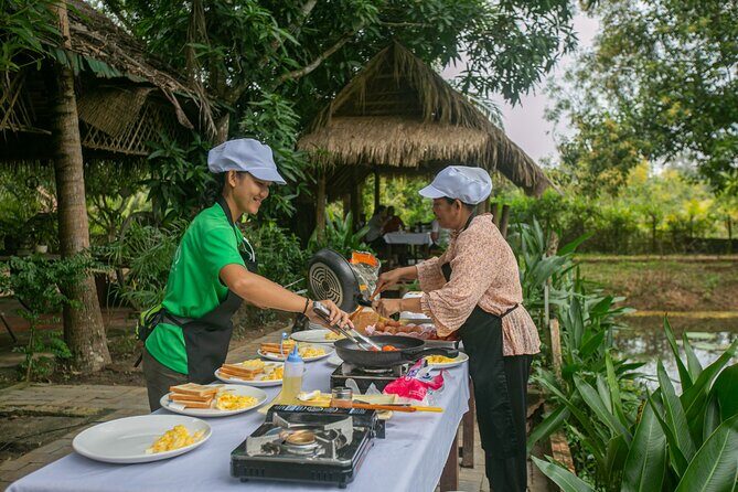 Angkor Sunrise Bike Tour with Breakfast and Lunch Included - Exploring the Temples by Bike