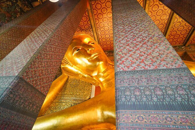 Bangkok Wat Pho and Flower Market Historical Walking Tour - Learning About Thai Traditions and Massages