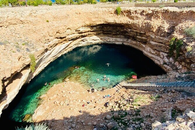 Full Day Group Tour to Wadi Shab Bimmah Sinkhole and Fins Beach - Practical Details and Tips