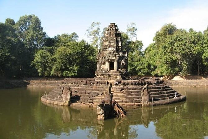 Half-Day Preah Khan and Neak Pean Temples from Siem Reap - Exploring Preah Khan: A Temple Surrounded by Roots and Carvings