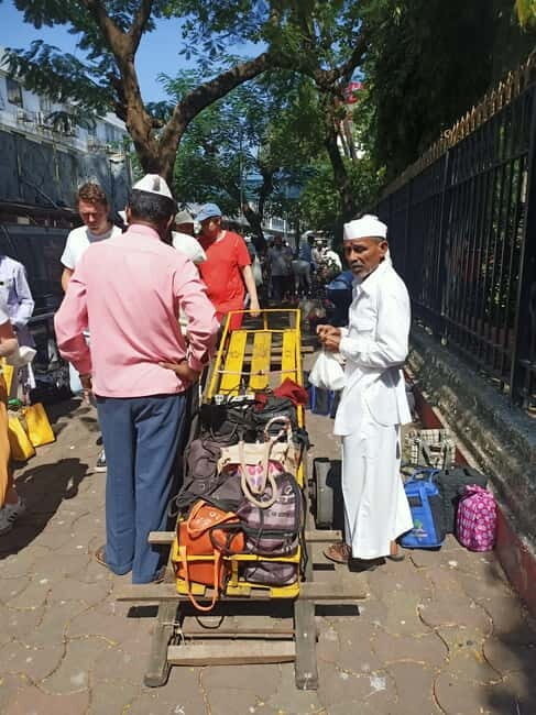 Meet Dabbawalas Visit Dhobi Ghat and Slum with Train Ride - Transportation, Cost, and Timing
