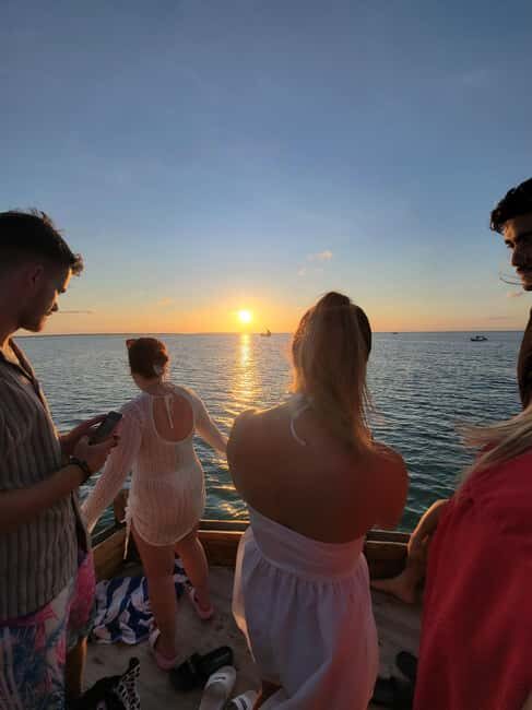 Nungwi: Dolphins,snokerlling &/or sunset cruising tour - Snorkeling at Mnemba Island: Underwater Oasis