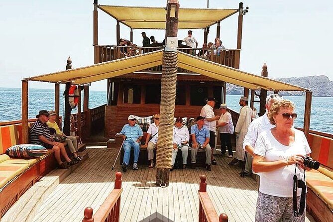 Omani Traditional Dhow Cruise: Sunset and Muscat Coastal View - The Sum Up