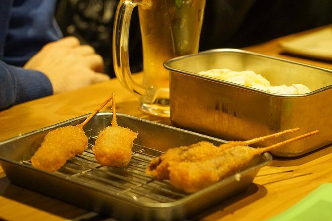 Osaka Local Foodie Walking Tour in Dotonbori and Shinsekai - The Guide and Group Experience
