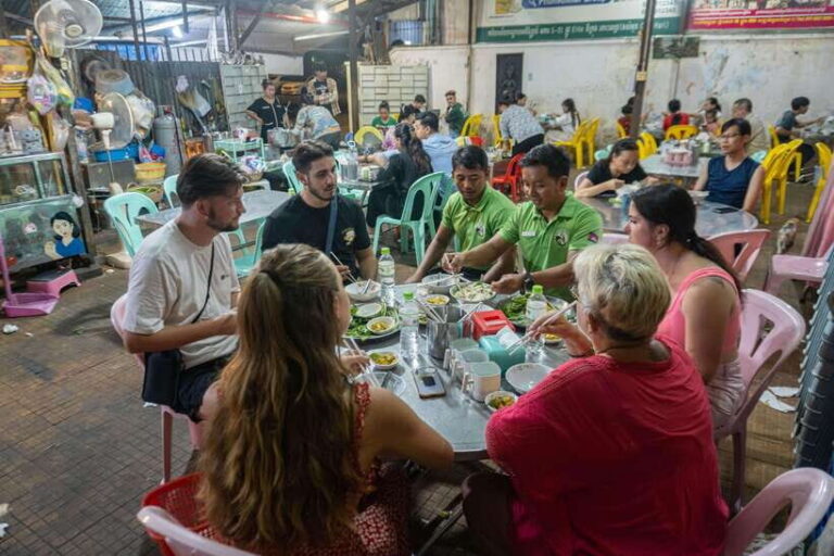 Phnom Penh Night Foodie Vespa Tour - The Guides and Atmosphere
