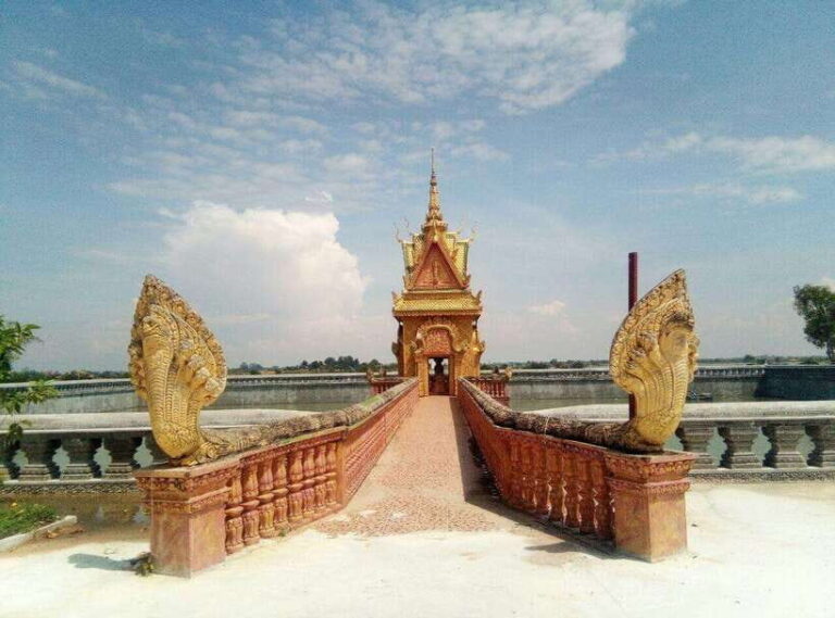 Phnom Penh: Udong Hill, Long Vek, and Phnom Reap Day Tour - Climbing Udong Hill: A Royal Walk with a View
