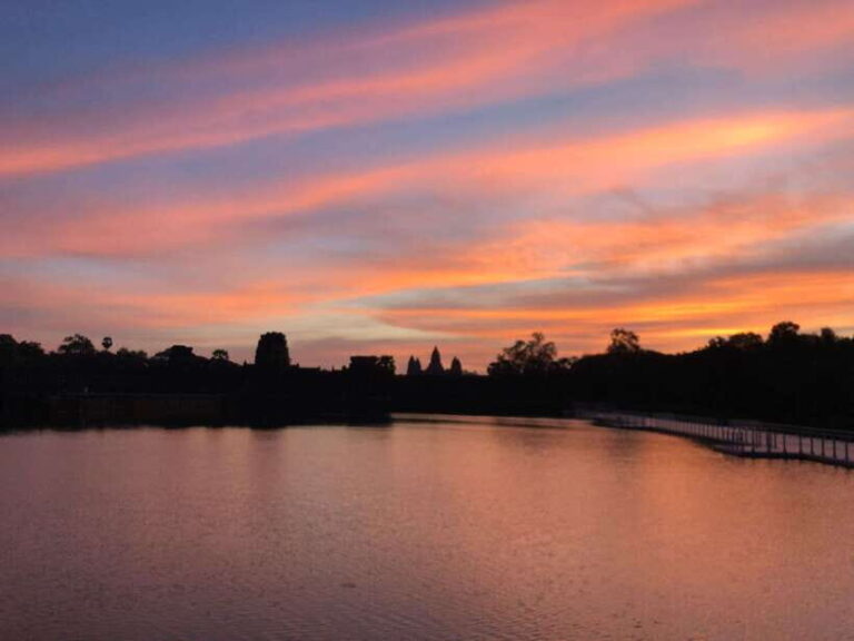Private Angkor Wat Sunrise Tours And Sunset Floating Village - Exploring the Iconic Temples: Bayon and Ta Prohm