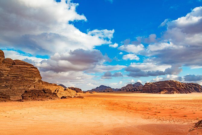 Private Full-Day Wadi Rum and Petra Tour from Aqaba - Walking Through Petra: The Rose-Red City