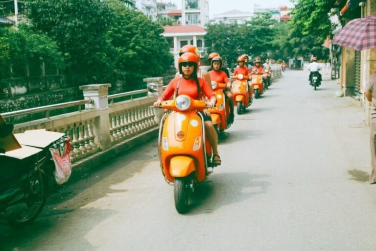 Red River delta & rural village with female Ao dai riders - Immersive Cultural Stops and Historical Insight