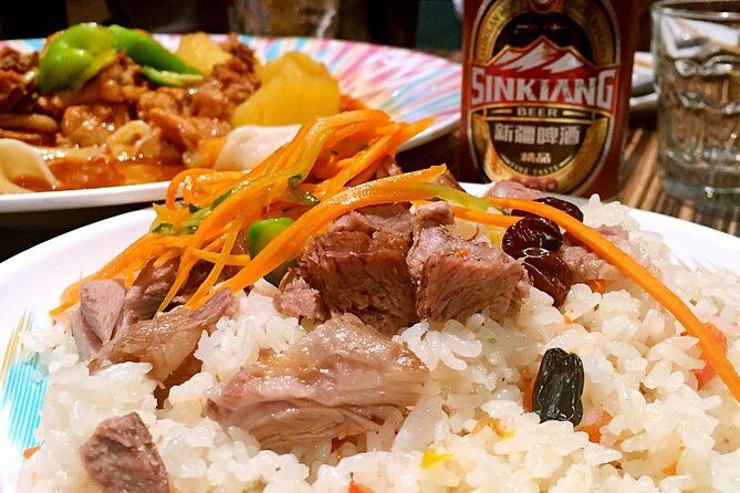 Shanghai Night River Cruise Tour with Xinjiang Style Dining Experience - The Dining Experience: Xinjiang Flavors and Cultural Entertainment