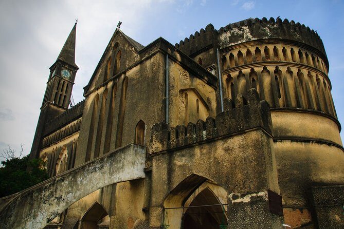 Stone Town Tour; Kuza Cave; Blue Lagoon; Starfish Adventure; The Rock Restaurant - Kuza Cave: Ancient Natural Wonder and Cultural Center