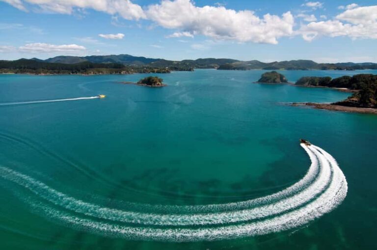 Bay of Islands HOLE IN THE ROCK & WAITANGI TREATY GROUNDS - The Ocean Adventure: High-Speed Thrills and Iconic Views